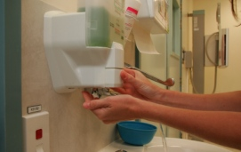 Washing hands with liquid soap